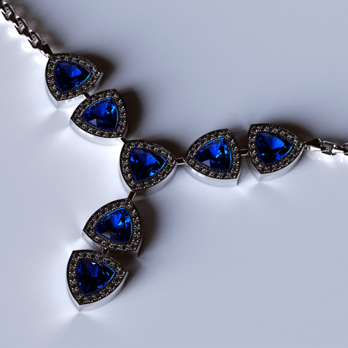 a modern white gold necklace with diamonds and sapphire gemstones